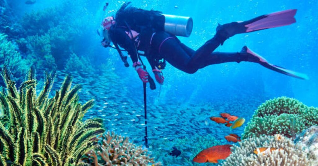 Scuba diver ascending slowly and performing a safety stop as per scuba diving rules.