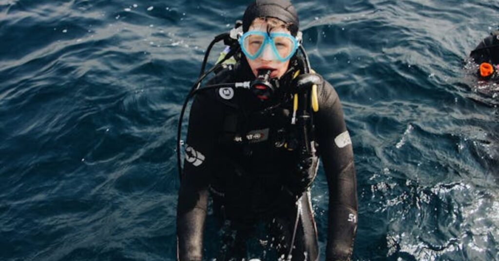 Scuba diver practicing safety techniques underwater

