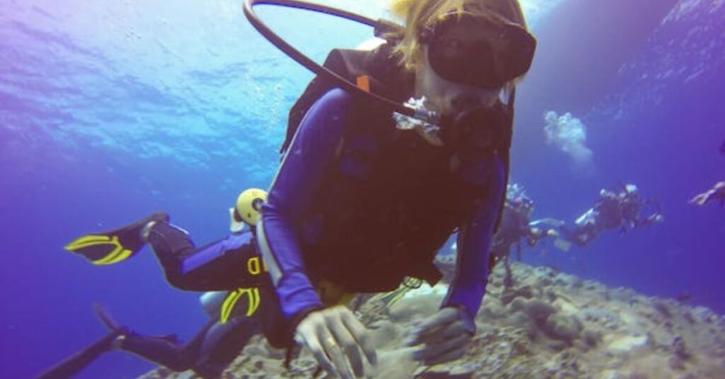 Diver exploring coral reef – Fun facts about SCUBA