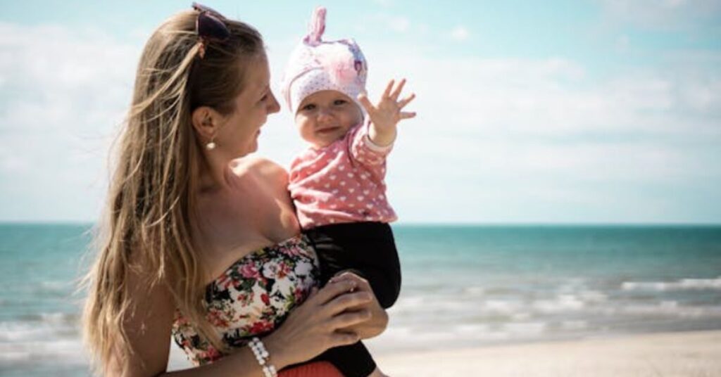 Curious parents reading a baby name book - Find the perfect ocean baby name for your little one