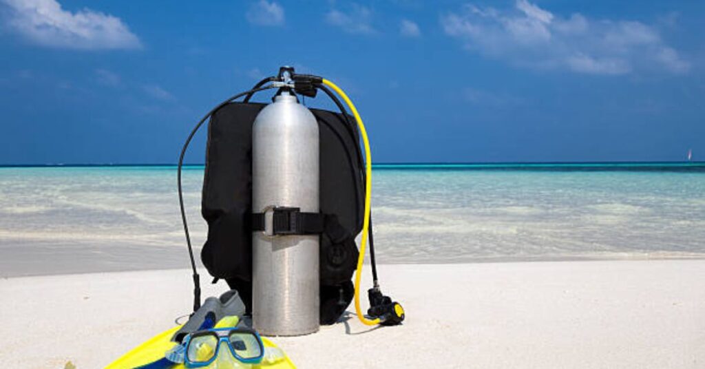 Scuba Refresher Checklist - Diver Checking Gear